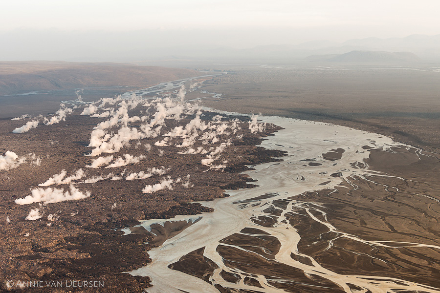 Lava of the volcanic eruption in Holuhraun streams into the rivier Jökulsá á Fjöllum in Iceland in 2014, creatling steam plumes.